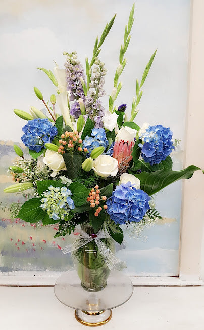Beautiful White with Blue Vase Arrangement