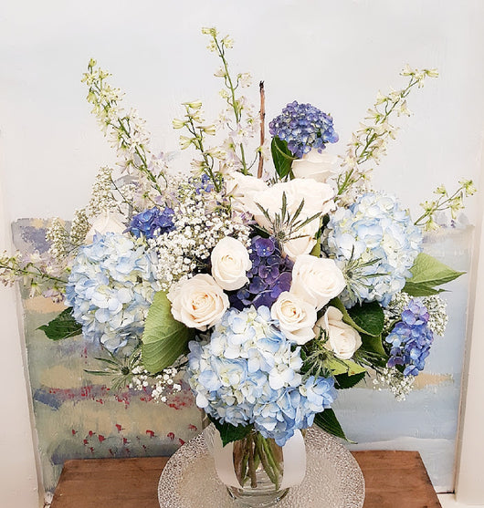 Beautiful White In Blue Vase Arrangement